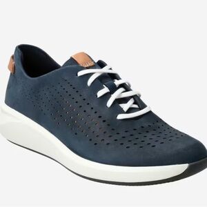 Clarks Art. 
Un Rio Tie Navy Sneakers with White Sole